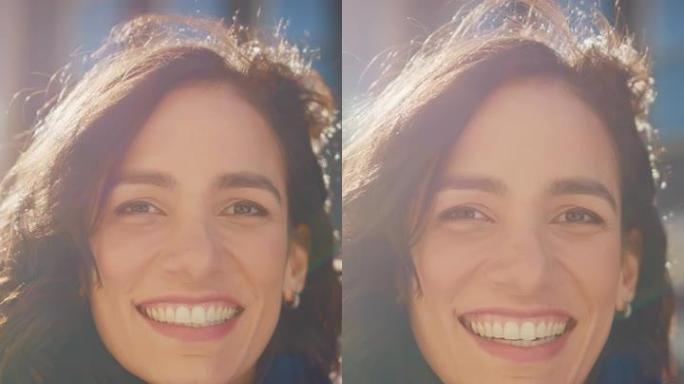 一位美丽的黑发西班牙裔妇女迷人微笑的肖像。快乐的年轻女人享受生活。垂直屏幕方向9:16的视频素材