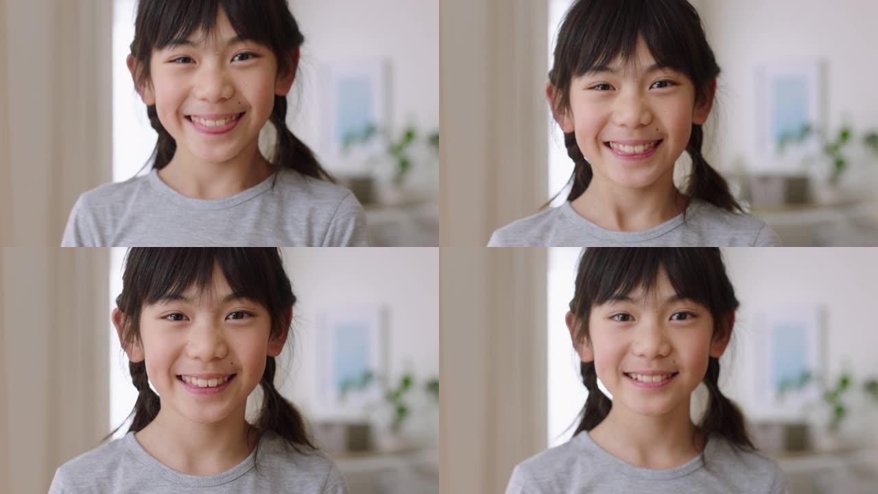 快乐的亚洲小女孩嬉戏微笑的肖像积极的童年4k镜头