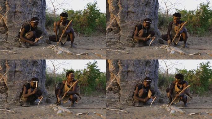 哈扎狩猎采集者部落成员以坦桑尼亚的传统方式制造长矛