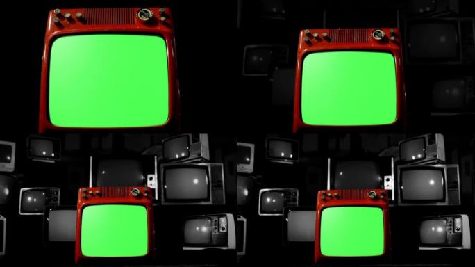 带有绿色屏幕的旧电视和背景中显示的一堆复古电视。4k分辨率。