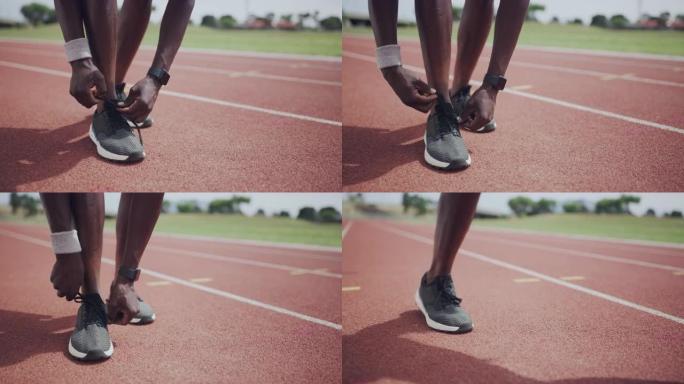 4k视频片段，一个无法识别的男人在跑步前系鞋带