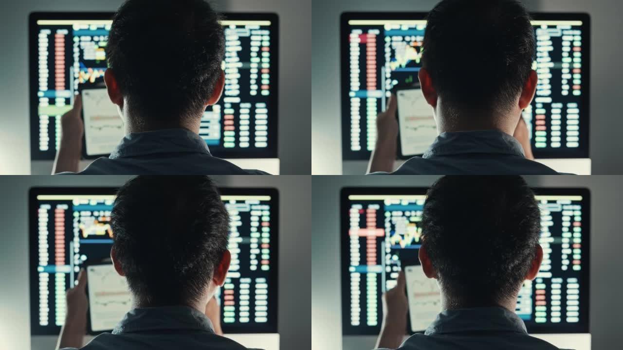 股市金融屏幕前的数字平板电脑上的商人交易股市