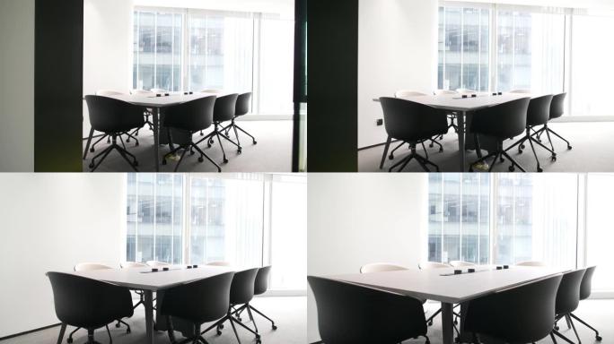 带椅子和桌子的现代会议室