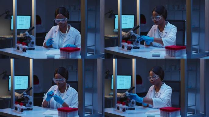 一位年轻的黑皮肤医生戴着防护眼镜，戴着手套和白色实验室外套，在实验室中标记了血液样本试管