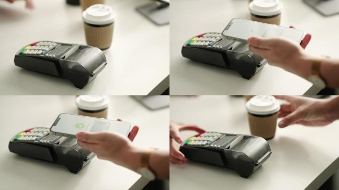 在咖啡店的NFC非接触式支付上通过手机支付