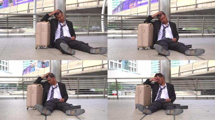 被解雇的商人出门去办公室时感到非常疲倦。白领员工被解雇，她坐在人行道上乞求一份新工作。