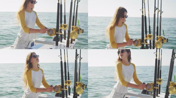 一个十几岁的高加索女孩在船上拿着钓鱼竿的侧视图