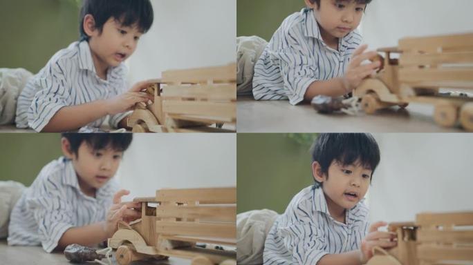 一个玩玩具的男孩。