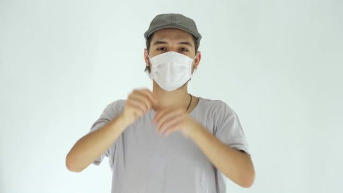年轻的成年男子戴着污染面具，以保护自己免受病毒侵害。4k视频，4k视频