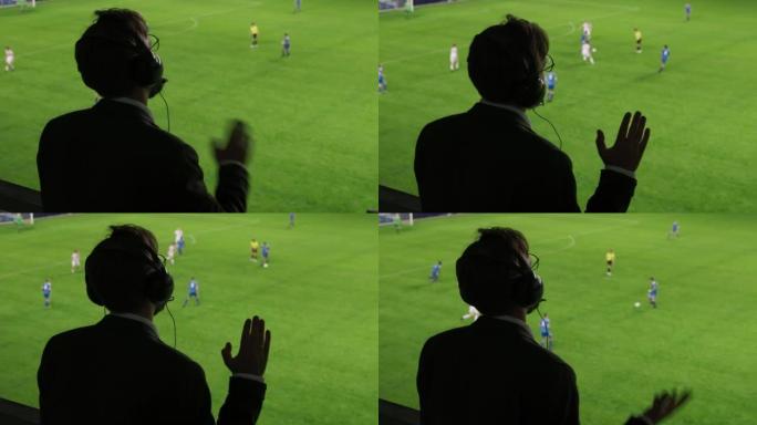 后视图体育评论员分析足球比赛，现场比赛。广播员在足球场和球场上的剪影，在他评论赛季最佳时刻，谈论顶级