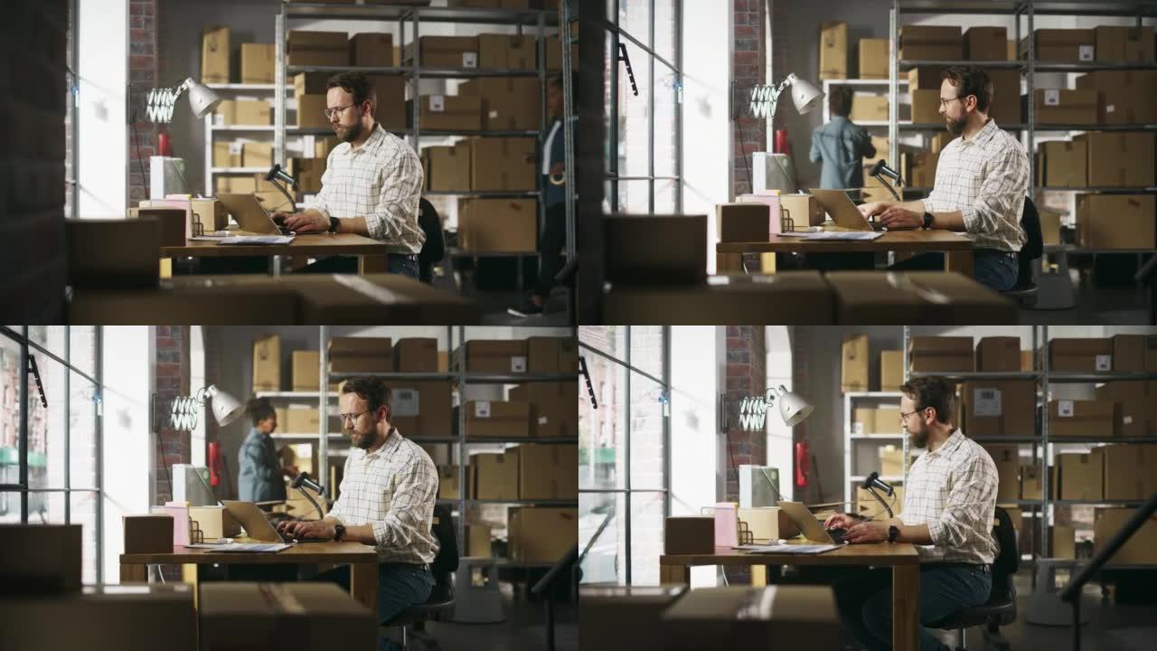 男性库存经理在储藏室使用笔记本电脑，与客户沟通，写下项目。时尚的小企业主在仓库工作，为客户履行订单。