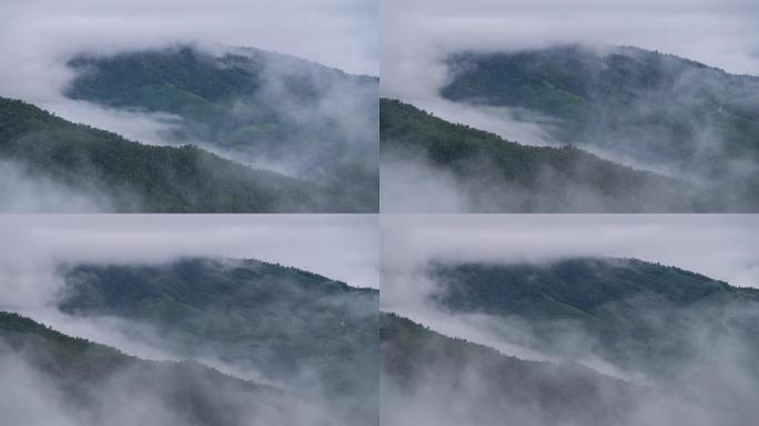 日出之前，云雾在山上移动的时光倒流
