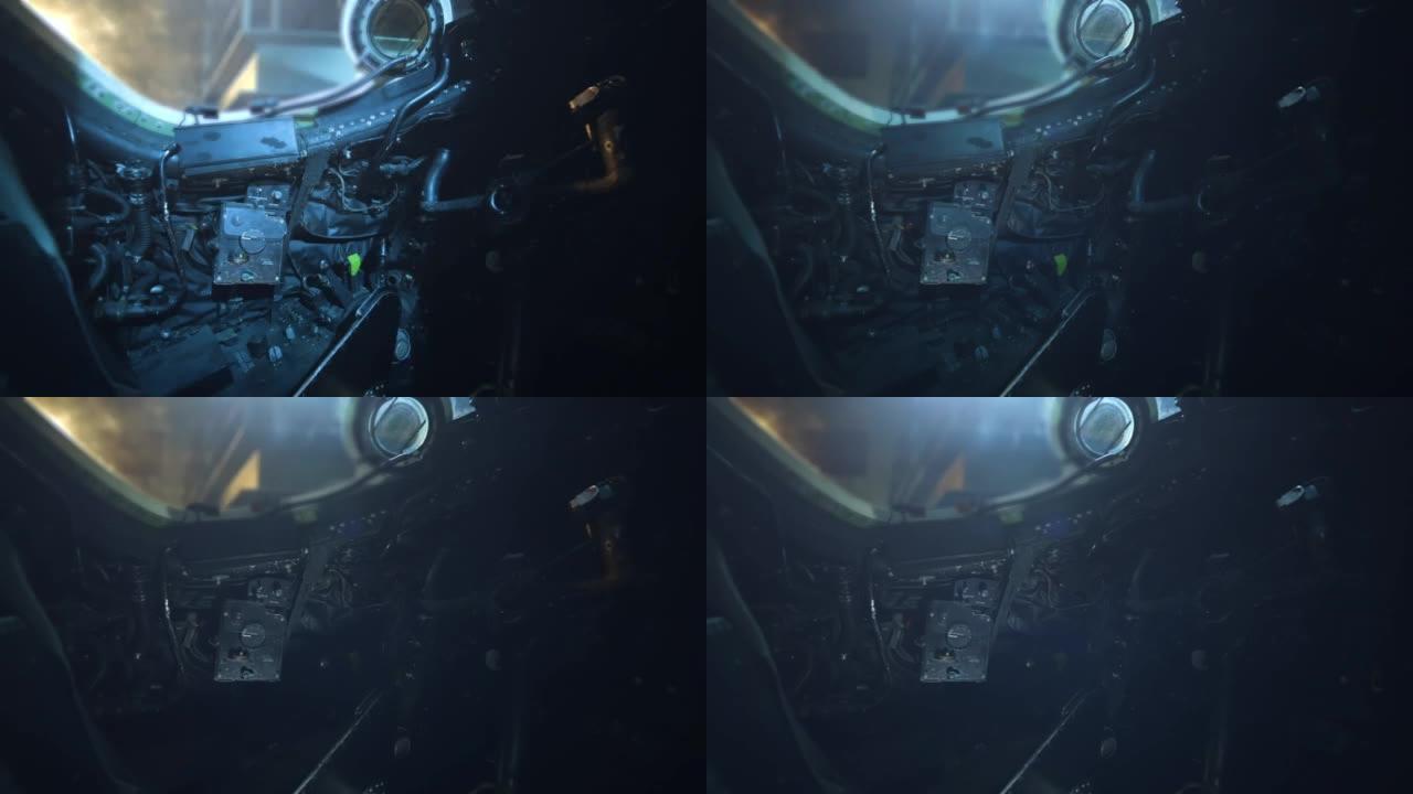 皇家空军堪培拉轰炸机的内部显示了侧面控制面板和背景中的间歇性灯光。特写。