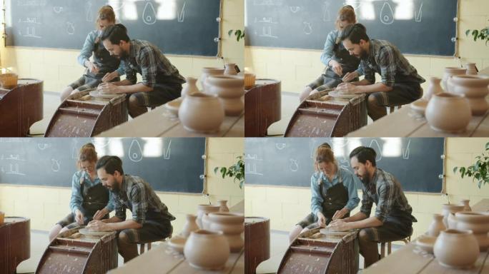 陶器车间男女制作纺车锅的慢动作