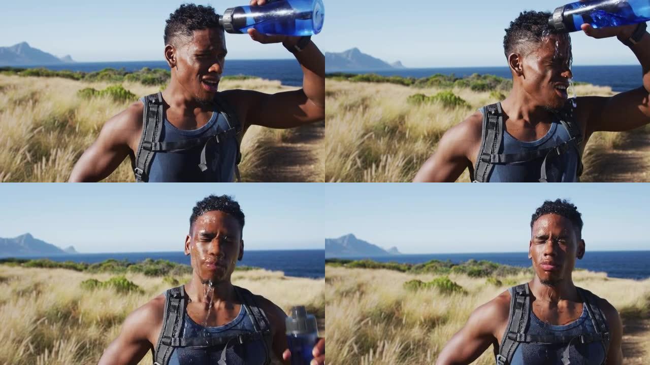 非裔美国人在海岸的乡村锻炼户外饮用水