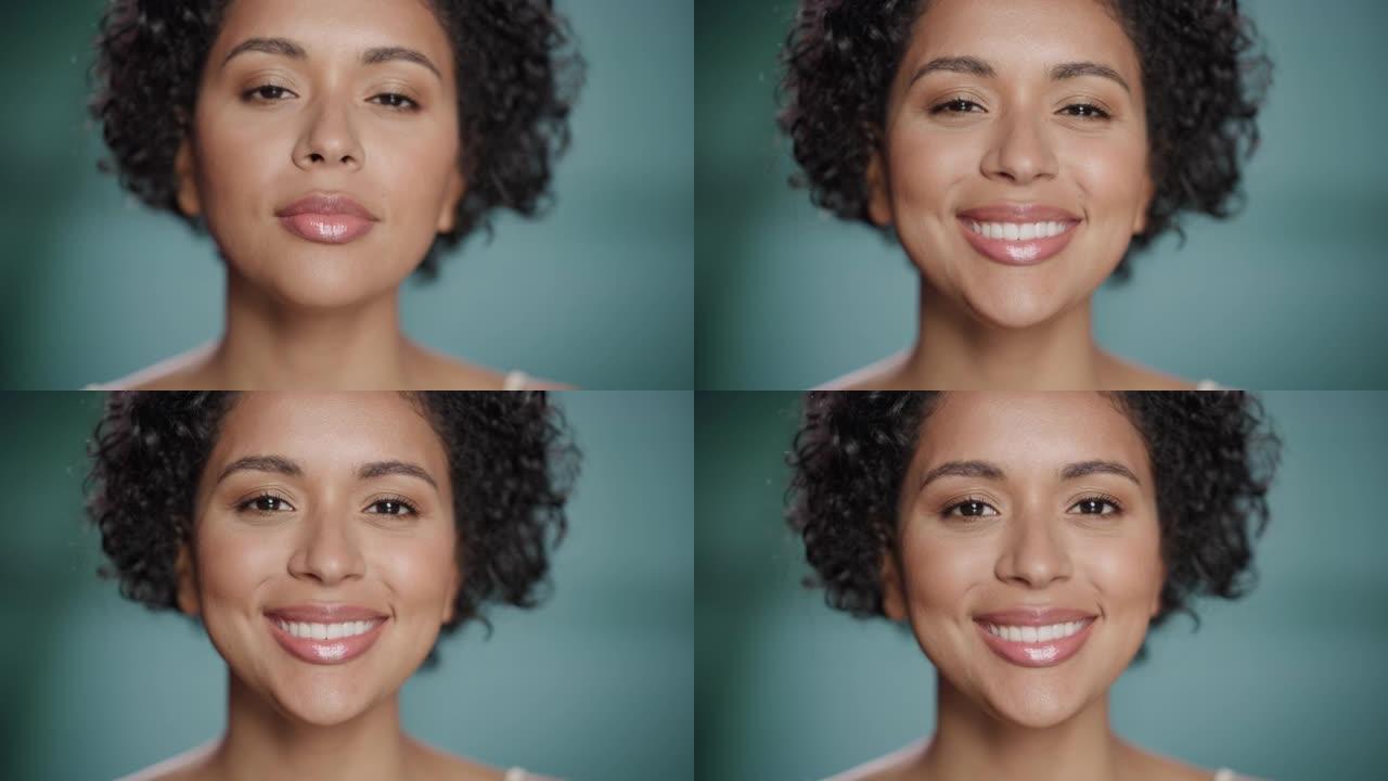 特写女性美女肖像。快乐的多民族黑人巴西妇女，自然健康的皮肤，卷曲的非洲头发摆姿势，微笑。柔软孤立背景