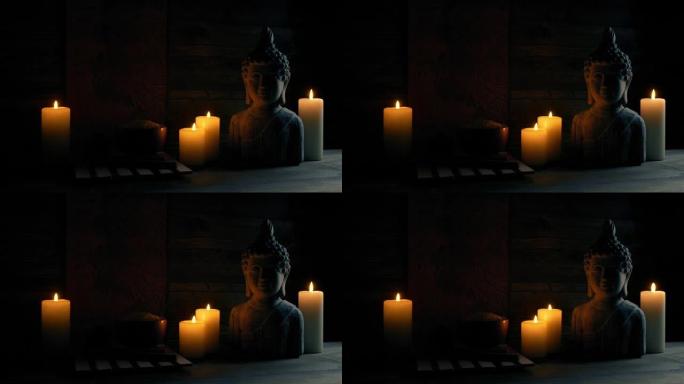 带蜡烛和佛像的水疗细节