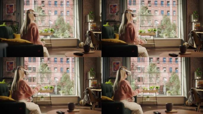 金色头发的女性在家中使用虚拟现实耳机和控制器。有创造力的女人坐在客厅的沙发上，玩VR视频游戏或从事工