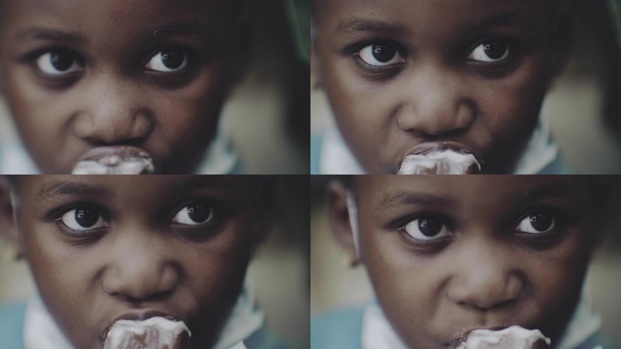 非洲儿童吃冰淇淋贫民窟非洲难民儿童特写