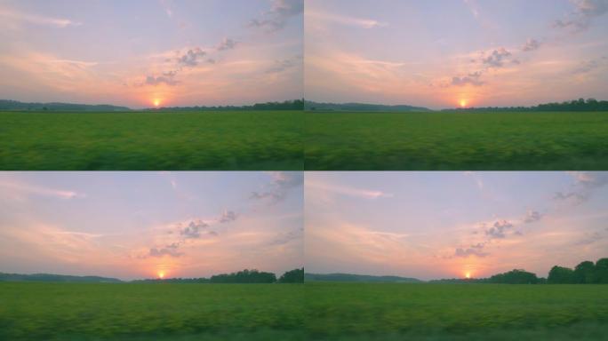 美丽的日落背景上的汽车旅行