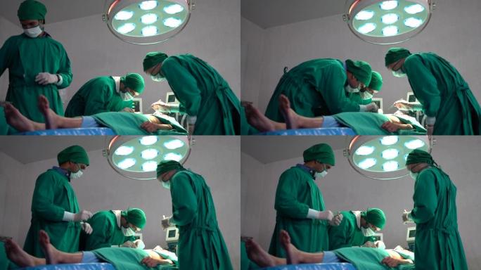 一名医疗专业人员正准备对躺在手术室床上的病人进行手术。