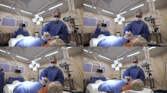 女医生在手术室镇静一名高级病人进行手术