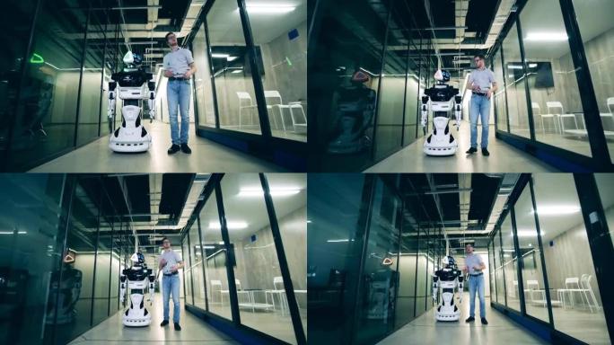 男性专家正在向机器人展示营业厅。人与机器人交流概念。
