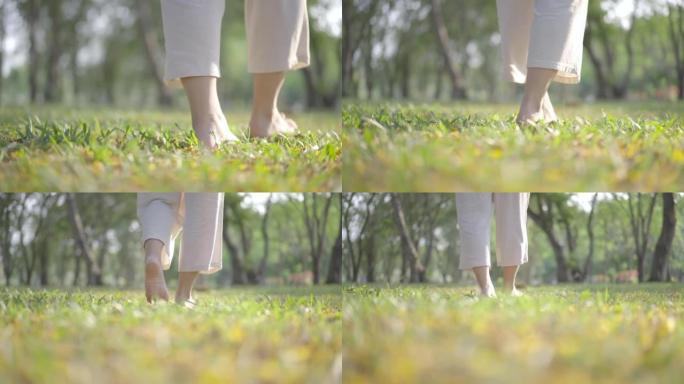 女人腿部行走在大自然中冥想瑜伽的特写