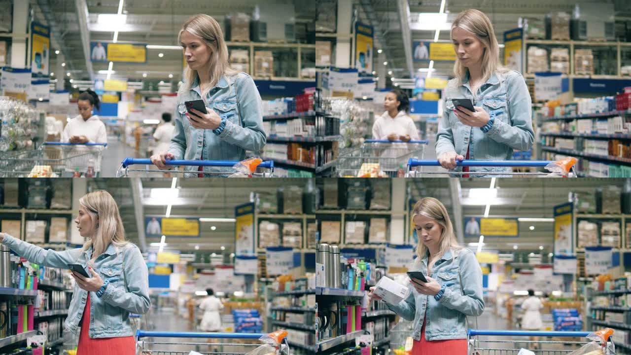 一名妇女在超市购物时正在浏览手机。超市里的女人，消费主义概念。
