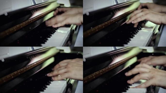 一个弹钢琴的人的手。特写。快速运动。放大。