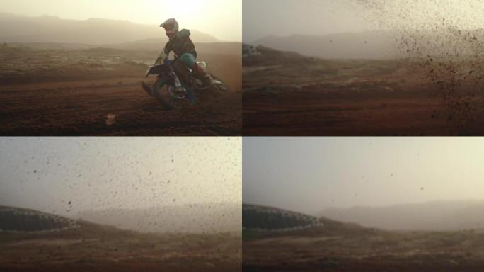 户外运动训练中专业骑手的污垢、灰尘和摩托车。男子骑自行车在肮脏，尘土飞扬的沙道上，在健康，健身和练习