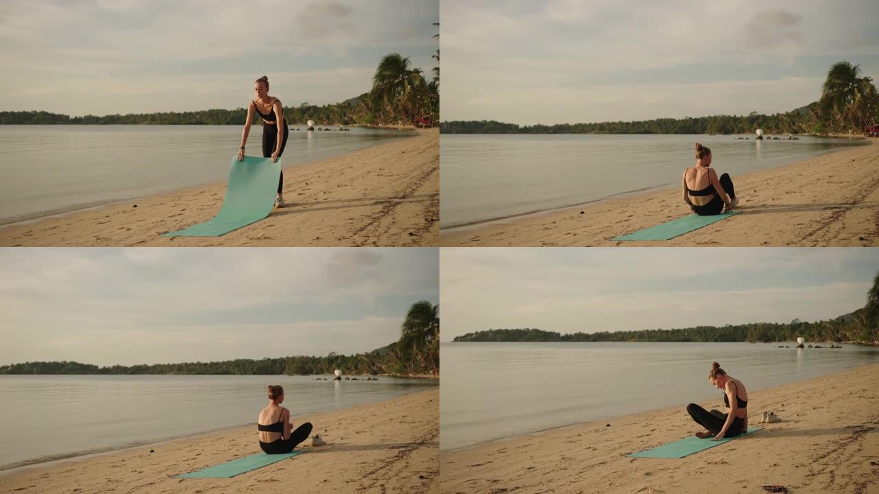 女人准备瑜伽课程看海海岸海景