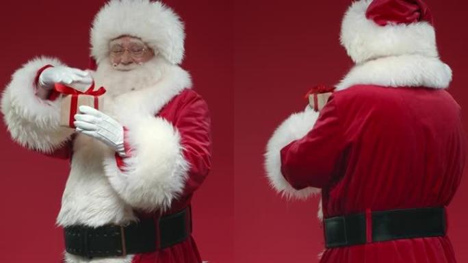 一个在红色背景上转身的圣诞老人，拿着一个小礼品盒，微笑着在视频结尾的镜头前展示它