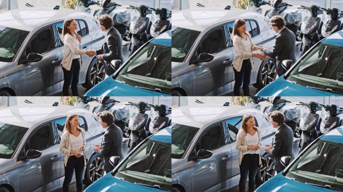 SLO MO汽车推销员握手并将新车的钥匙交给女顾客