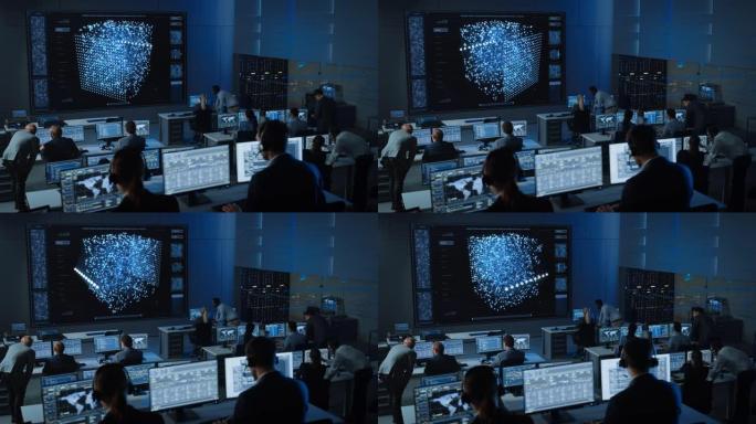 在现代监控办公室工作的工程师的移动镜头，在大屏幕上显示实时神经网络。监控室大数据科学家和管理人员坐在