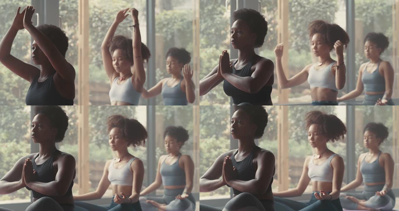 一群年轻女性在瑜伽课上冥想的4k视频片段