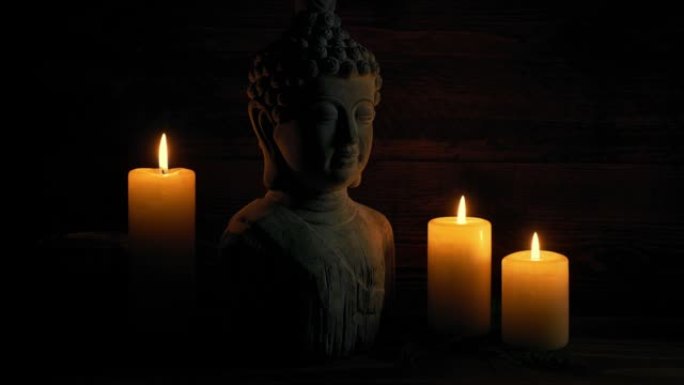 佛像和蜡烛的和平寺庙场景