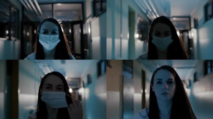 SLO MO Young女医生在医院走廊上行走时摘下口罩