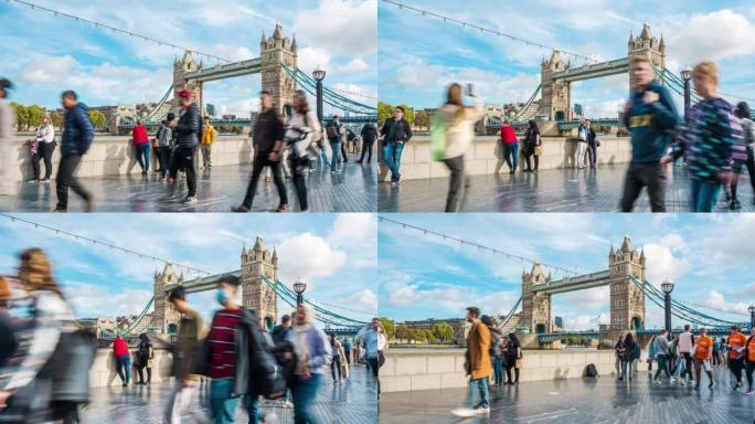 在英国伦敦塔桥 (Tower Bridge) 的皇后大道南岸附近的人群行人和游客步行和观光的时间流逝