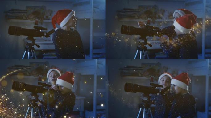 电影之夜拍摄的快乐小女孩姐妹穿着星空睡衣和圣诞老人帽子，正在通过望远镜观看魔术般的光芒圣诞老人在圣诞