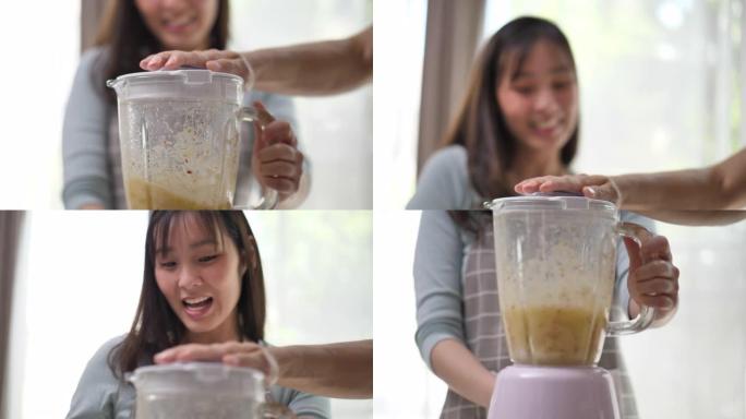 快乐的亚洲夫妇喜欢准备果汁健康的生活方式