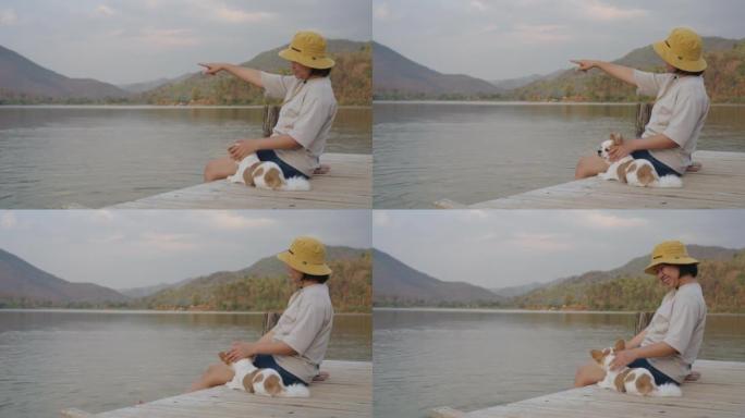 单身女性宠物爱好者在廉价旅游中享受美丽平静的河流。