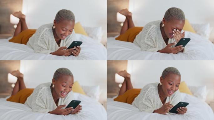 床，电话和一个黑人妇女在社交媒体上冲浪，并嘲笑有趣的视频。放松，浏览并点击互联网上的帖子。在卧室在线
