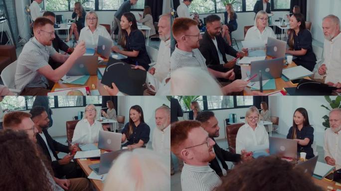 美丽快乐的中年女领导，公司老板与多民族团队一起在轻办公室慢动作