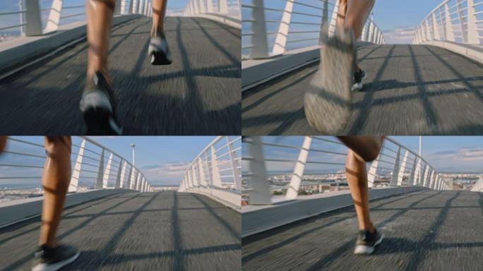 健身，城市和腿部在有氧运动中在桥上跑步，或者在纽约进行马拉松运动的速度训练。夏季在沥青上冲刺的运动运
