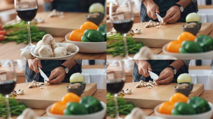 烹饪，蘑菇和人用刀工作的人的手，准备和切碎蔬菜，以实现健康的素食。素食、健康营养师和私人厨师在家庭厨
