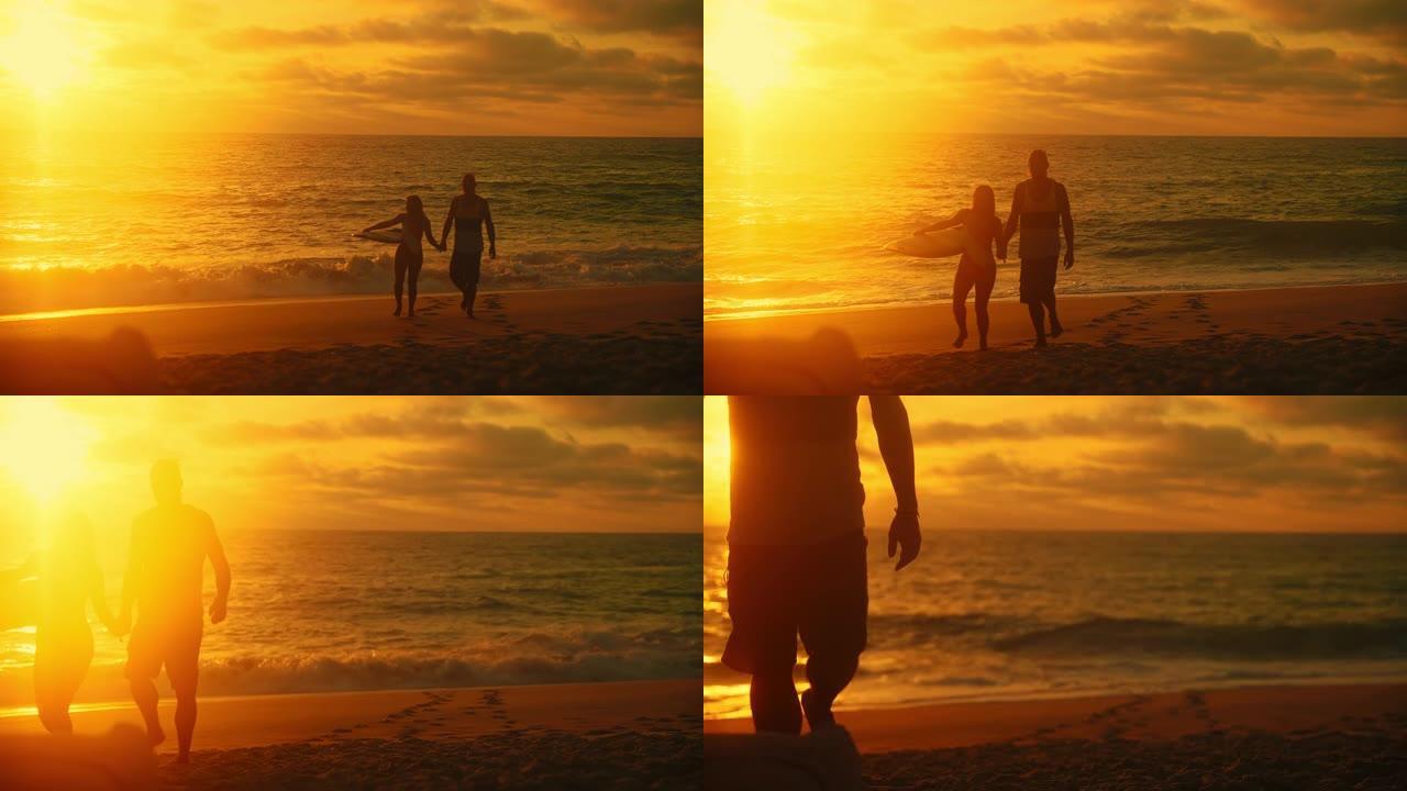 美丽的日落女子手持冲浪板从海边散步时，异性夫妇牵手