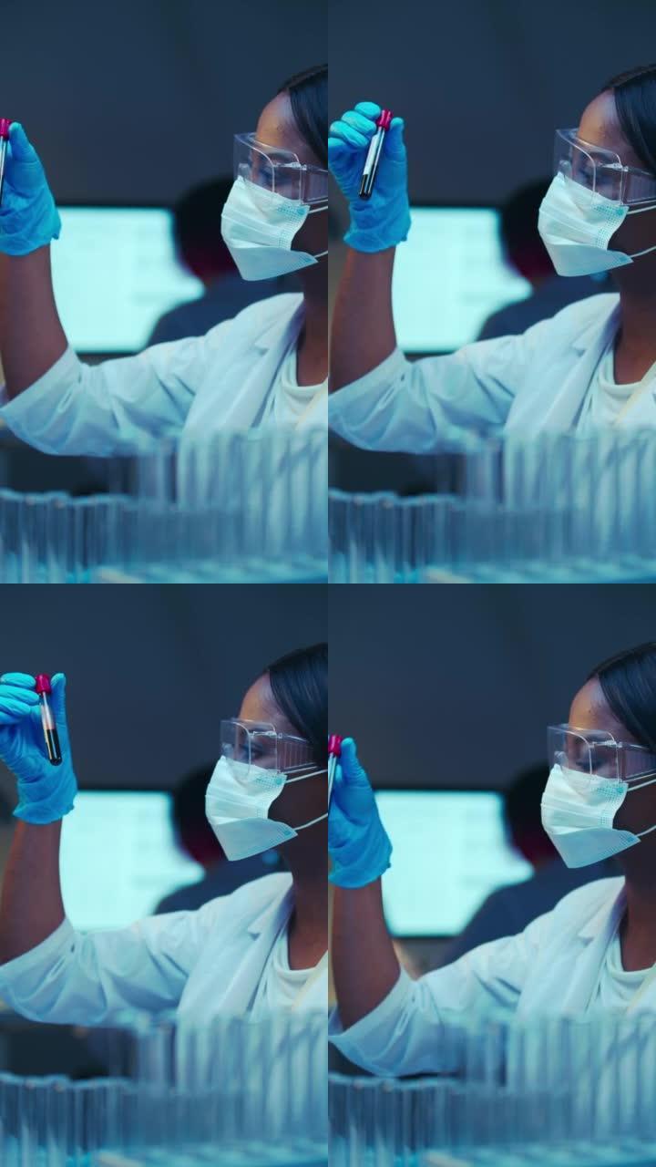 一位年轻漂亮的非裔美国医生穿着白色实验室外套，在现代实验室中使用试管工作的特写镜头