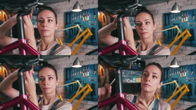 女自行车机械师专注于每一个细节。