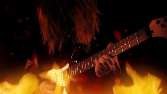 摇滚吉他手在火中演奏